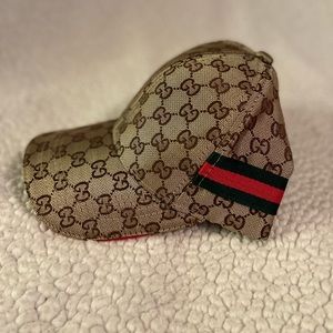 Brand new Gucci polo style hat. Classic Gucci design with rich colors.